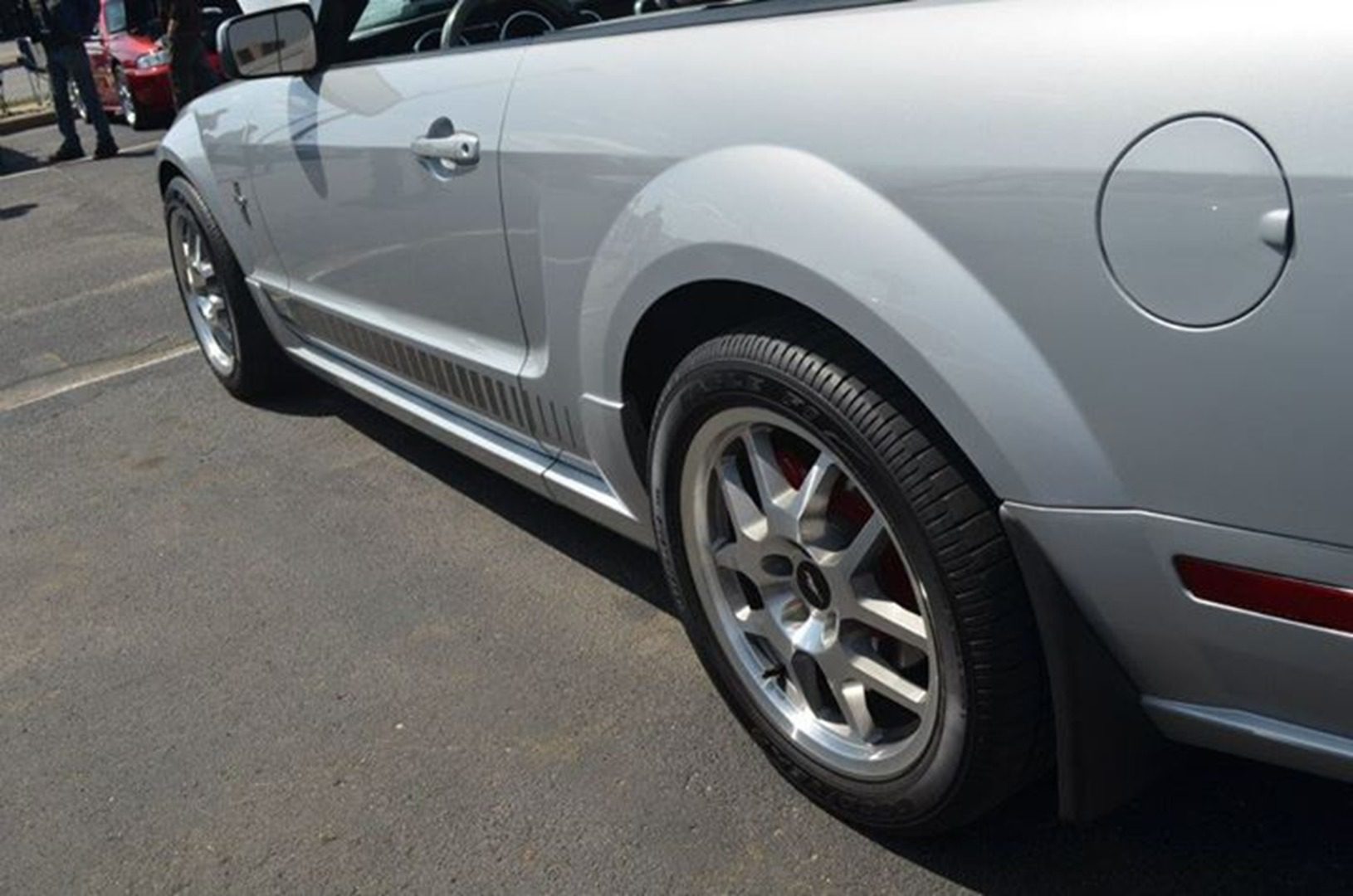 Rear side of a shiny silver car