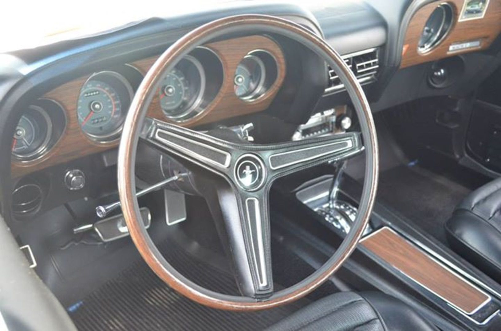 Vintage dashboard featuring analog gauges