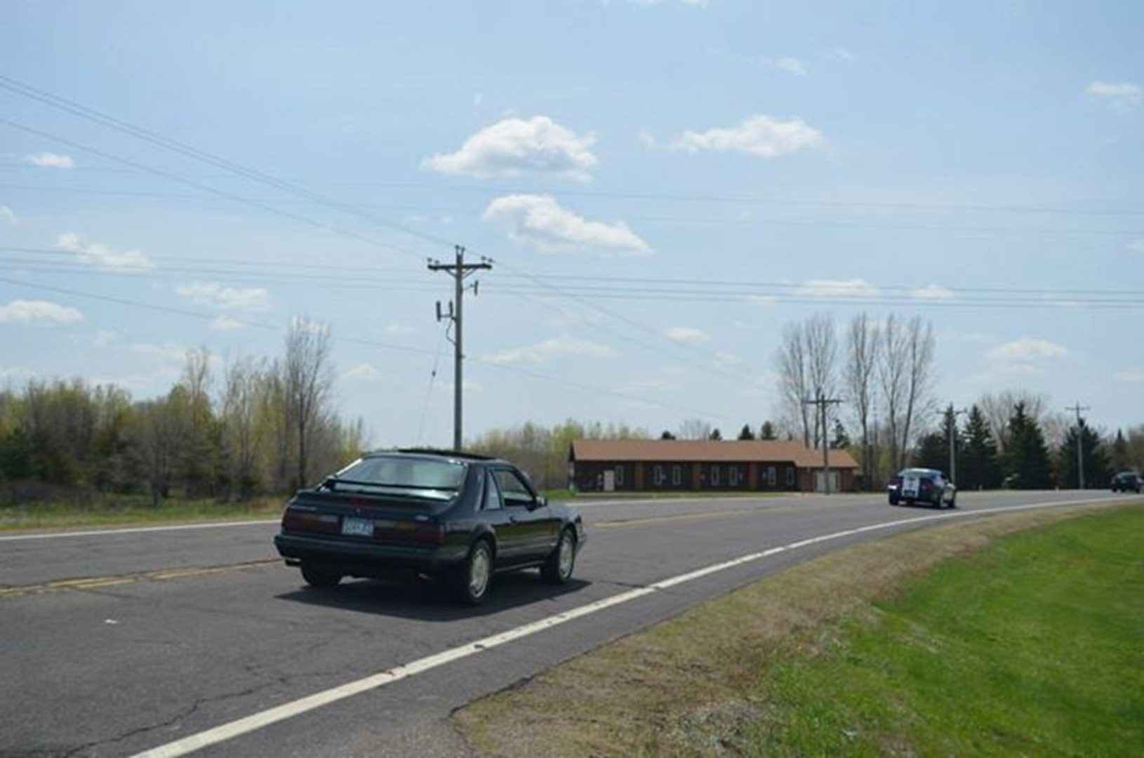 Car driving on rural road