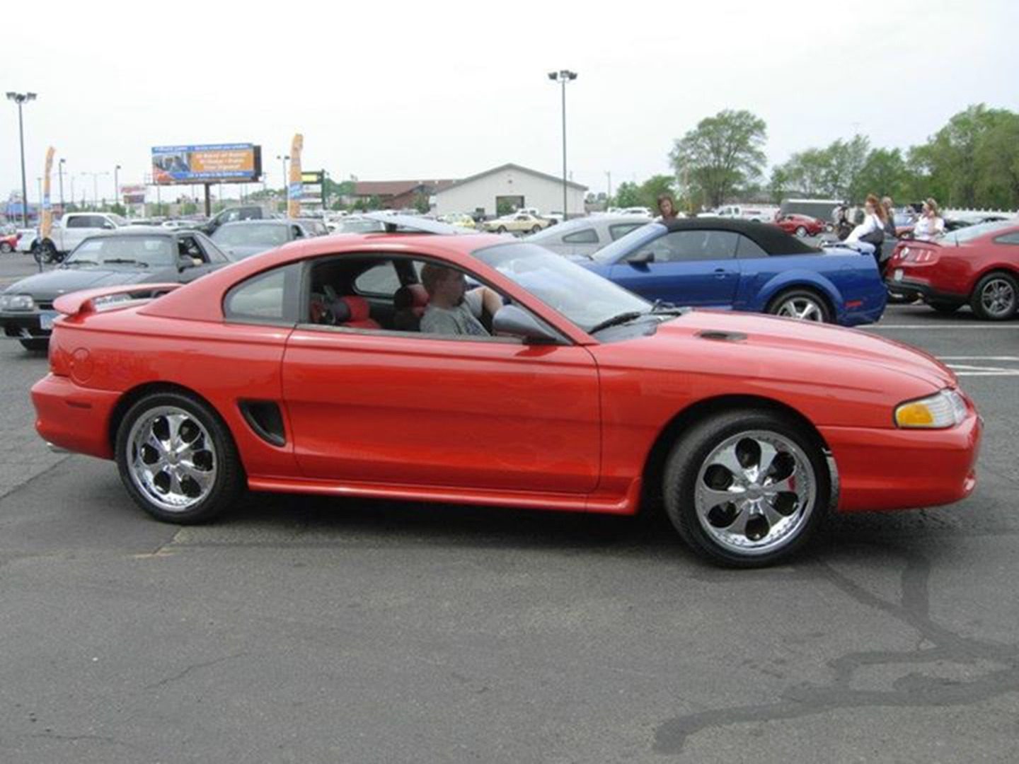 Classic red coupe with chrome wheels