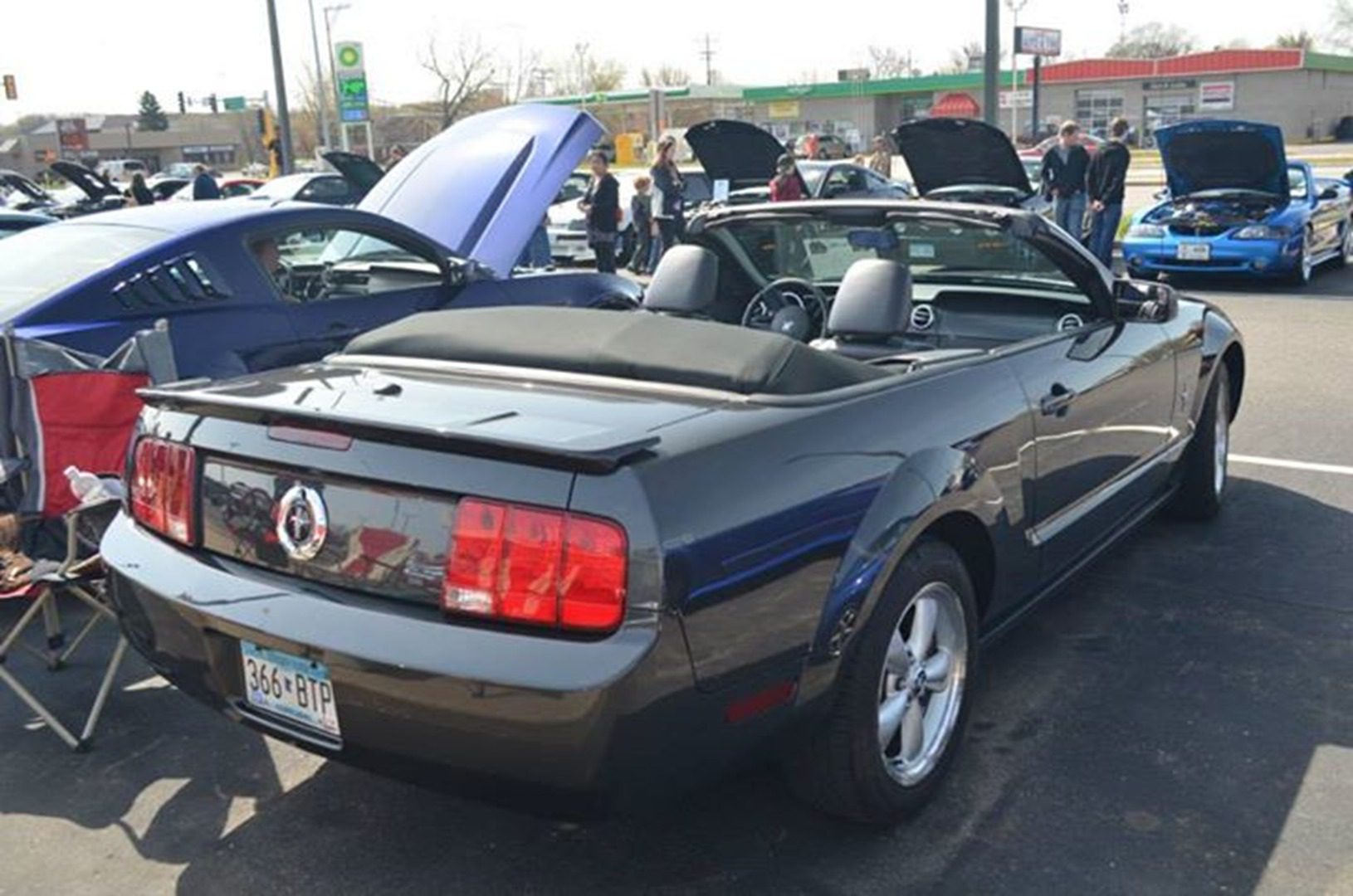 Car enthusiasts at vehicle exhibition