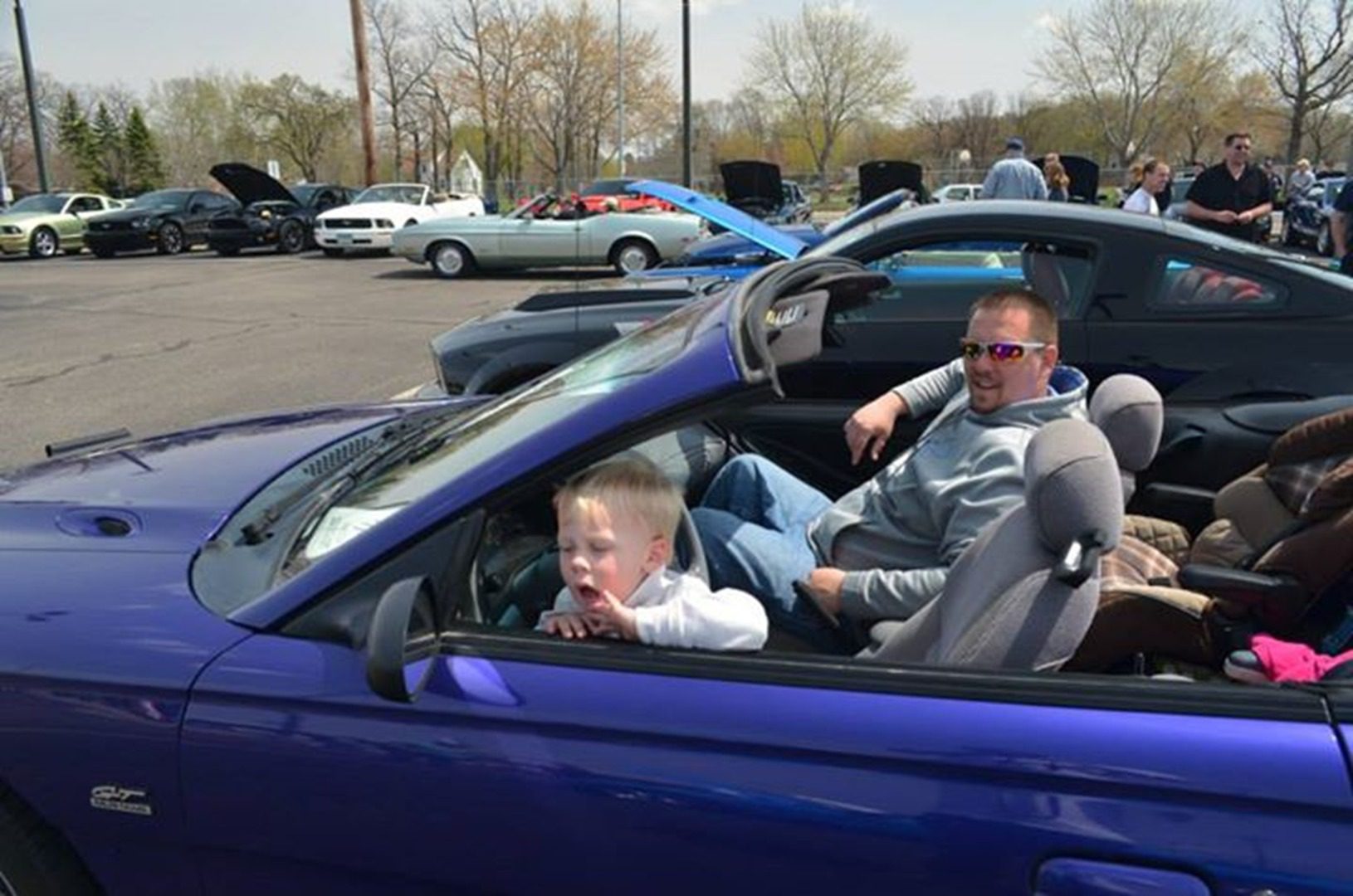 Parked cars at outdoor car show