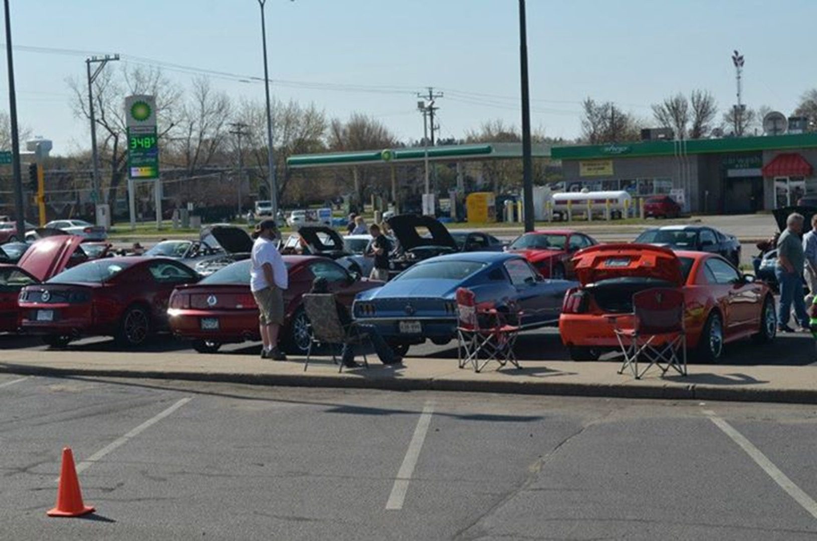 People viewing classic cars