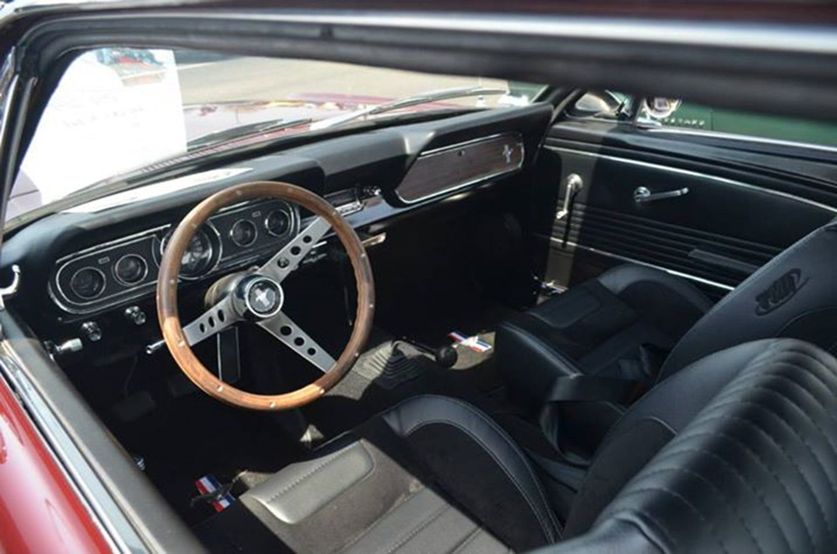 Retro car cabin with black upholstery