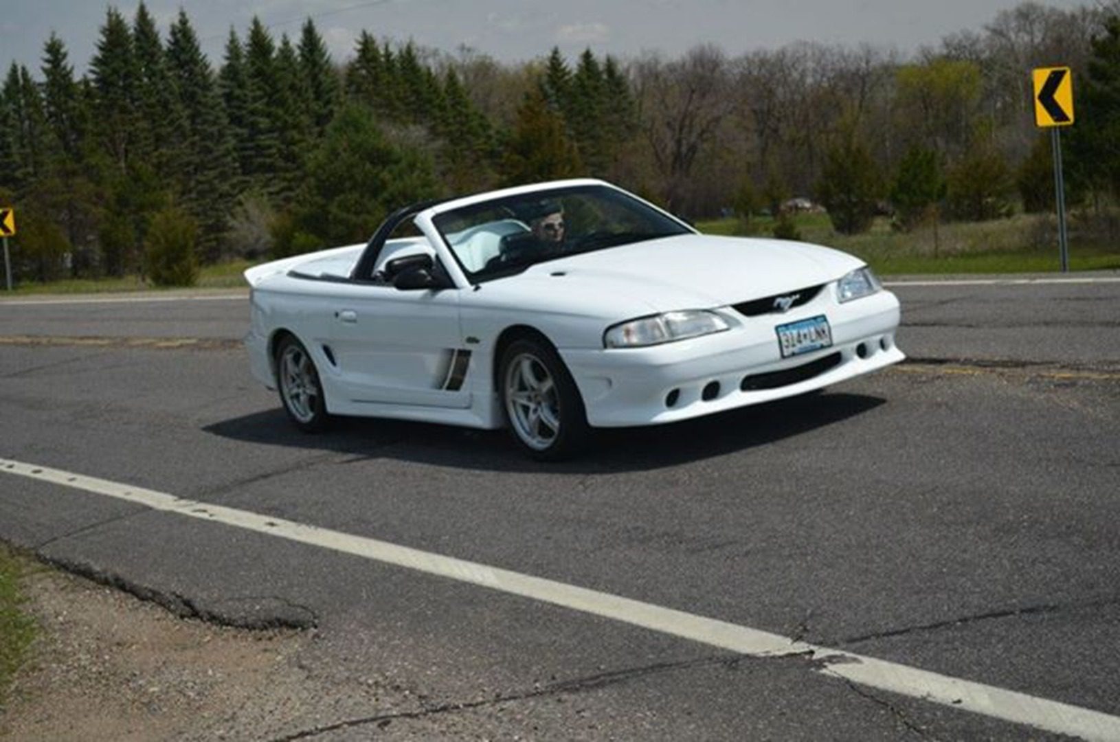 Sports car turning on asphalt road